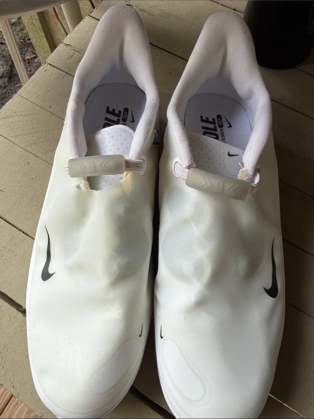 Nike Men’s White Slip-On Sneakers with Black Swoosh